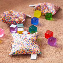 Afbeelding in Gallery-weergave laden, Little Botanic Label - Sensorische pittenzakjes 7 stuks - Regenboog + super confetti