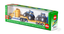 Afbeelding in Gallery-weergave laden, SIKU 1805 - Vrachtwagen met New Holland tractoren
